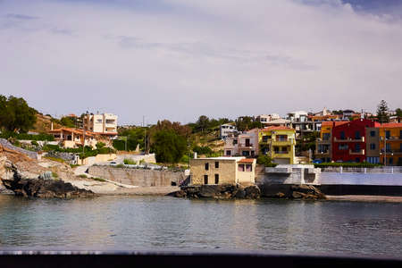 PANORMO, THE CRETE ISLAND, GREECE - MAY 30, 2019: Beautiful view to the village of Panormo, the Crete island, Greeceのeditorial素材