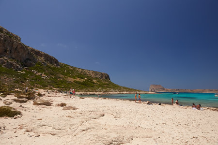 GRAMVOUSA - BALOS, THE CRETE ISLAND, GREECE - JUNE 4, 2019: The people on the beach of Balos, the Crete island.のeditorial素材