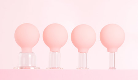 Glass jars for face vacuum massage. Cosmetology and face fitness concept.