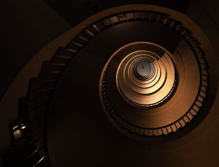 Spiral staircase in a tall multi-floor house, in the form of a "golden ratio", architecture, conceptの写真素材