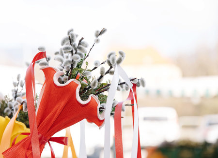 Festive bouquet adorned with colorful ribbons and white pussy willow branches, a traditional,...