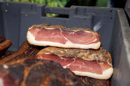 smoked meat on a grill in a restaurant, close-up