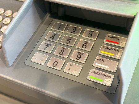 Close-up of atm keypad with buttons and numbers.