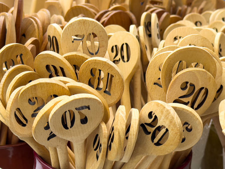 Wooden bingo number plaques with stenciled numerals.の写真素材