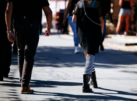 Street style fashion: urban scene with people walking outdoors.の写真素材