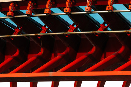 Abstract architectural detail of red and blue steel structure.の写真素材