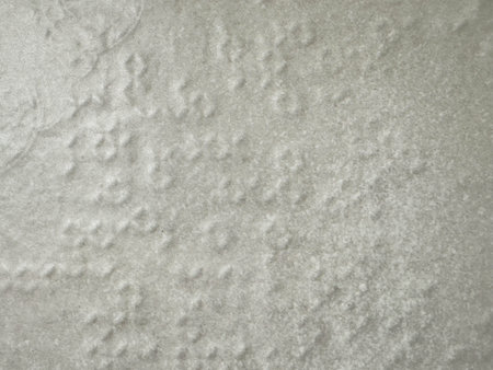 Smooth white marble surface with subtle texture patterns.の写真素材