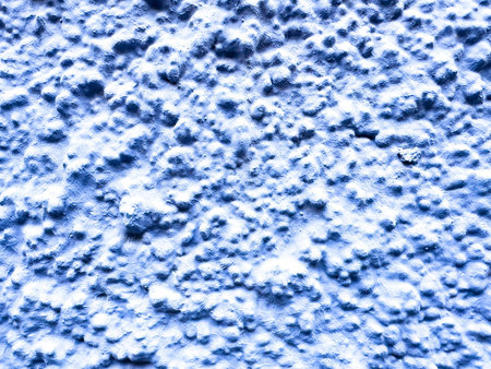 Textured blue surface with intricate pattern and bumpy texture.の写真素材