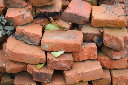 Dump of old broken brown bricks