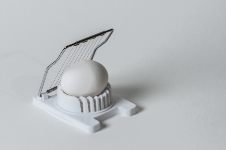 eggslicer ready to take on an eggの写真素材