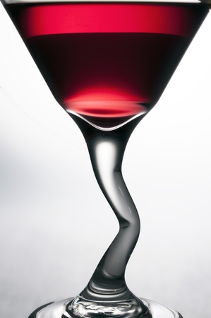 Outline of glass with red martini back litの写真素材