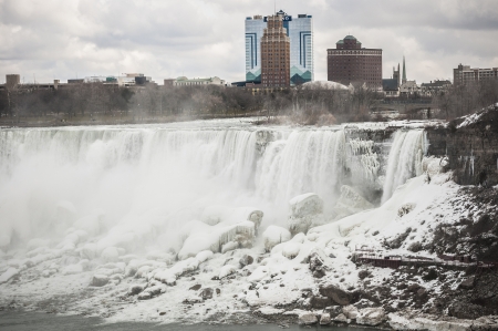 American falls covered with snow during winterの写真素材