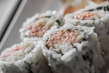 Japanese rice sushi on a platter macroの写真素材