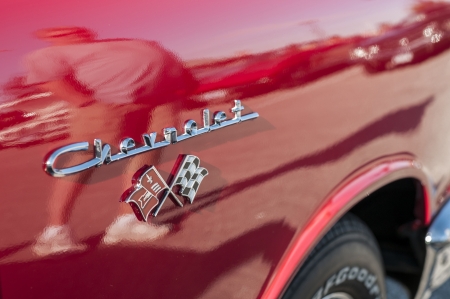 Chevrolet logo embossed on red corvetteのeditorial素材