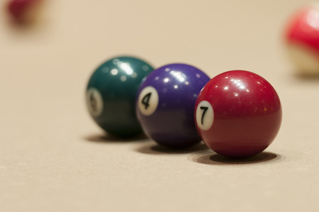 Ball number 7 and other billiard ballsの写真素材