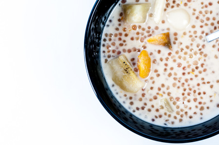 Ginataan a sweet  filipino desert on black bowlの写真素材