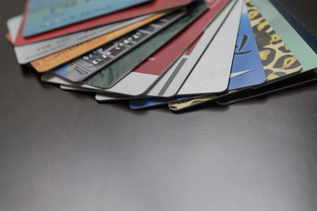 collection of credit cards in a pile.の写真素材