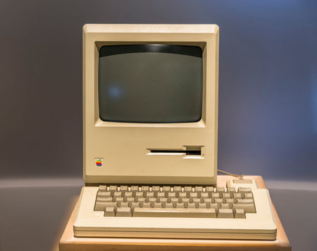 An Old apple (mac) computer on display in the museumのeditorial素材