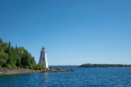 Big Tub Lighthouse is an active lighthouse located near Tobermory in Bruce Peninsula, Ontario, Canada. The lighthouse was originally lit in 1885 and is still used up to this day.の写真素材
