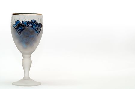 Tall wine glass with blue transparent spheresの写真素材