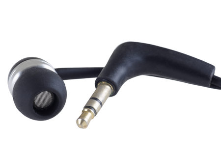 Black earphone isolated on white background, closeup