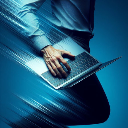 Close up of businesswoman hands typing on laptop computer over blue backgroundの素材