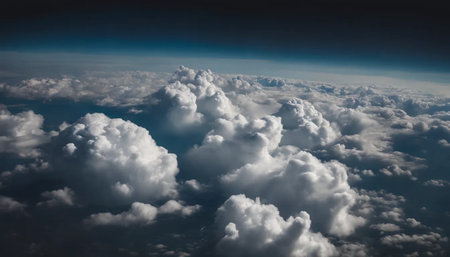 Clouds and sky as seen through window of an aircraft flying above the earthの素材