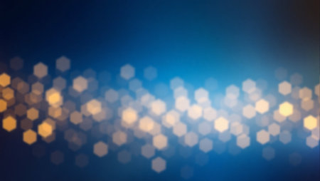 A vibrant blue and orange background with a multitude of hexagonal shapes scattered throughout. The blue and orange colors create a striking contrast. The shapes are of different sizesの素材