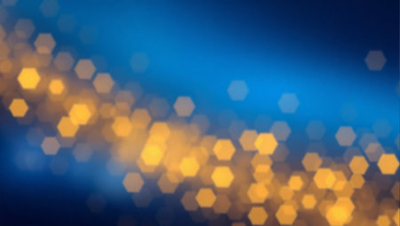 A vibrant blue and orange background with a multitude of hexagonal shapes scattered throughout. The blue and orange colors create a striking contrast. The shapes are of different sizesの素材