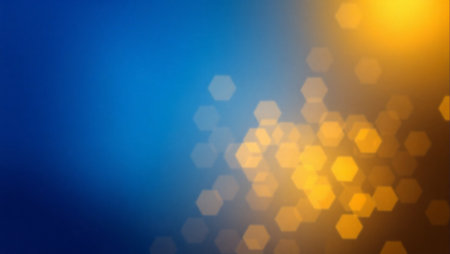 A vibrant blue and orange background with a multitude of hexagonal shapes scattered throughout. The blue and orange colors create a striking contrast. The shapes are of different sizesの素材