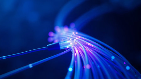 network cable close up with fiber optical network cable in blue light backgroundの素材