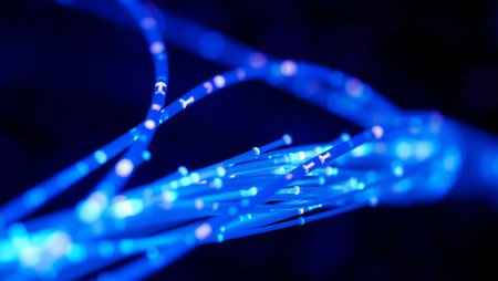 close up of fiber optic cable in blue light with shallow depth of fieldの素材