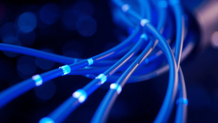 close up of fiber optic cables in network server room or data centerの素材