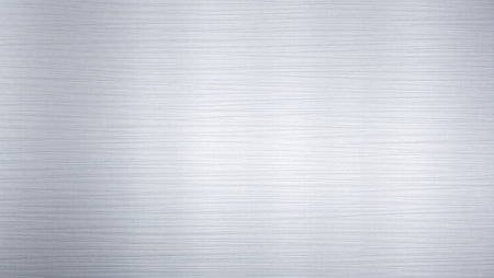Metal background or texture of brushed steel plate with reflected light and shadowの素材