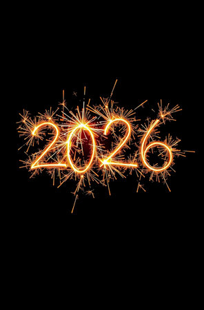 Happy new year 2026 written with Sparkle firework and stars on black backgroundの素材