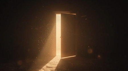 Door in the dark with a beam of light through it.の素材