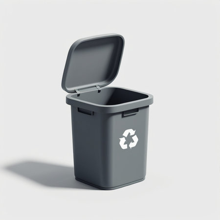 Black trash can isolated on a white background. 3d rendering.の素材