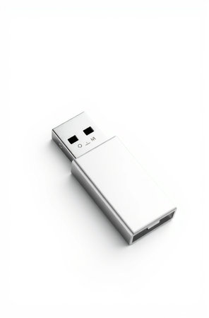 Silver USB flash drive isolated on white background. 3D illustration.の素材