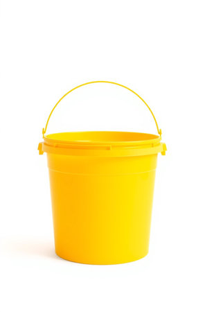 Yellow bucket isolated on white background with clipping path. Side view.の素材