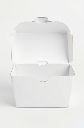 White cardboard box isolated on white background. Mockup for design.の素材