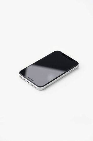 Black smartphone on a white background. Isolated. Close-up.の素材