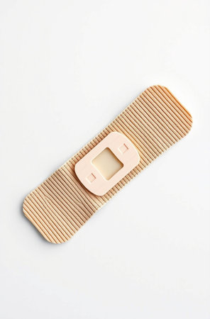 Electronic medical thermometer isolated on white background. Top view.の素材