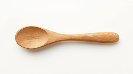Wooden spoon on white background. Top view. Flat lay.の素材