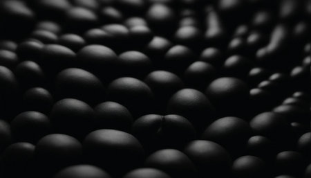 Abstract background of black plastic balls. Close-up. Selective focus.の素材