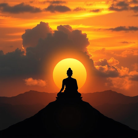 Silhouette of buddha on top of mountain at sunsetの素材
