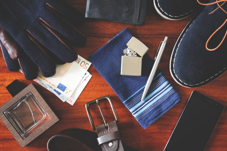 set of number mens accessories on wooden table instagram filterの写真素材