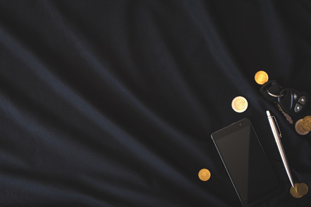 the contents of the pockets of men on a black backgroundの写真素材