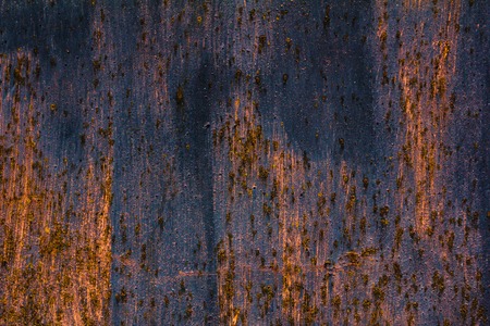 Detailed structure of rusty metal. dark backgroundの写真素材
