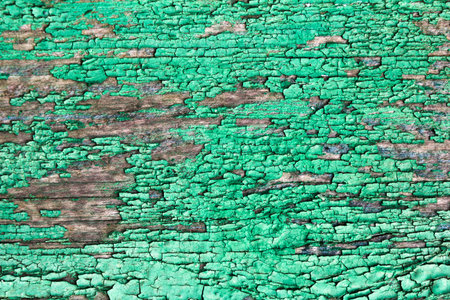 old vintage grunge green board with cracksの写真素材