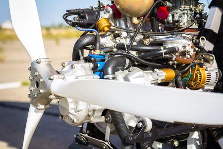 Close up of propeller and other parts on plane engineの写真素材